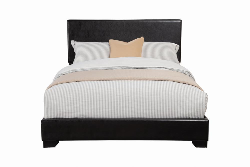 Conner Eastern King Upholstered Panel Bed Black